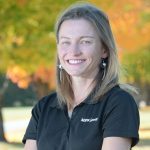 Profile picture of Alyson Slack with fall foliage in the background