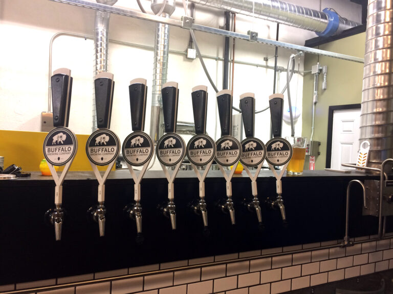 row of beer taps